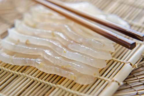 誘人牙簽魚片美食攝影圖，廣告素材下載